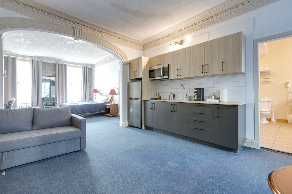 Superior Room | Living area | 32-inch flat-screen TV with cable channels