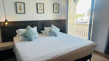 Family Room, Balcony | Minibar, free WiFi, bed sheets