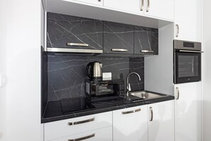 Fridge, microwave, oven, stovetop - Modern Apartments with Private Balcony - Premium One Bedroom Apartment (Kastel Novi)