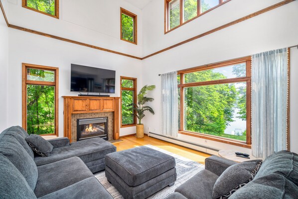 Fireplace, table tennis - Lake Home on Pokegama w/dock, sauna, game room. (Harris Township)