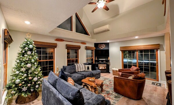 Smart TV, fireplace, table football, books