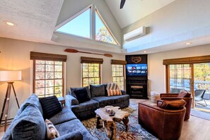 Smart TV, fireplace, table football, books