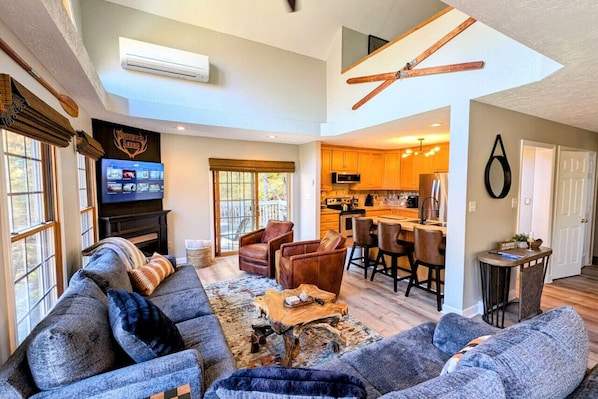 Smart TV, fireplace, table football, books