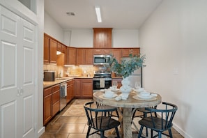 Fridge, microwave, oven, stovetop - Steel Studio ~ Stylish 2BR + Fenced Yard (College Station)