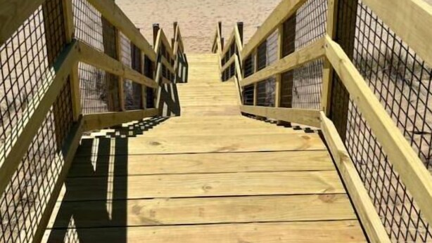 A wooden boardwalk leading to a beach with a clear view of the ocean. - Walk to Beach, Ping Pong, King Beds, Sleeps 6 (Muskegon)