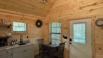 Fridge, microwave, coffee/tea maker, cookware/dishes/utensils