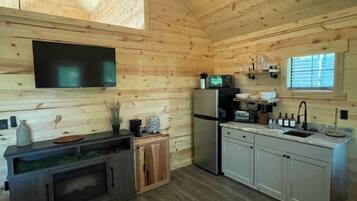 Fridge, microwave, coffee/tea maker, cookware/dishes/utensils