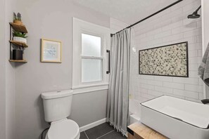 Shower, hair dryer, towels, shampoo