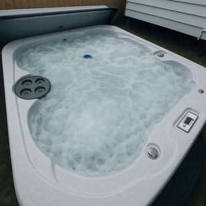 Bañera de hidromasaje al aire libre