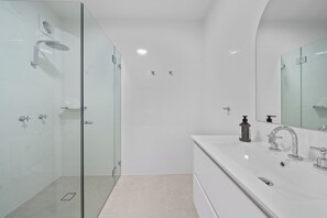 Shower, towels, soap, toilet paper