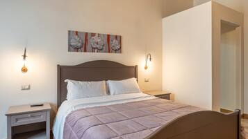 1 habitación, tabla de planchar con plancha, wifi gratis y ropa de cama