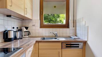 Réfrigérateur, four, plaque de cuisson, lave-vaisselle