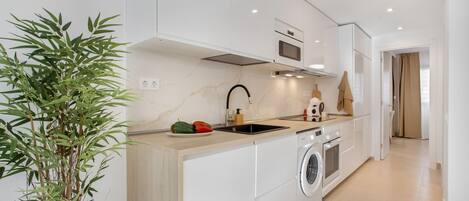 Fridge, microwave, coffee/tea maker, highchair