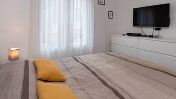 1 slaapkamer, een strijkplank/strijkijzer, gratis wifi, beddengoed