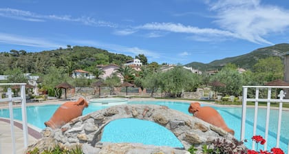 Ferienwohnung 'Bilocale Dolores' mit Gemeinschaftspool, Wi-Fi und Klimaanlage
