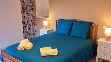 3 slaapkamers, een strijkplank/strijkijzer, beddengoed