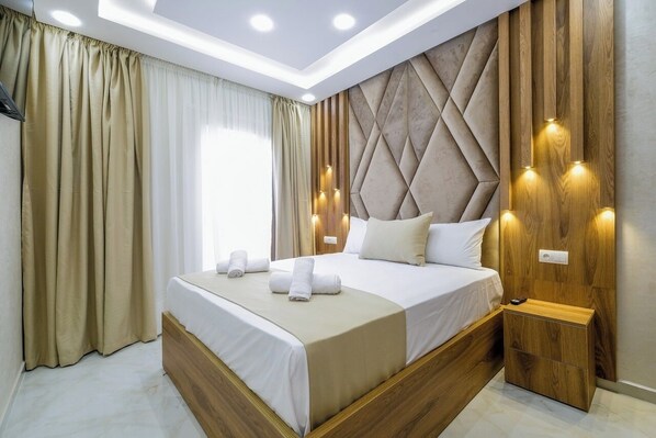 2 habitaciones, tabla de planchar con plancha y cuna de viaje