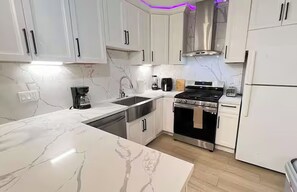 Fridge, microwave, dishwasher, coffee/tea maker