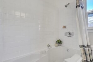 Hair dryer, towels, soap, toilet paper