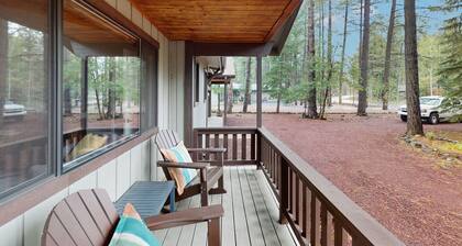 Immerse yourself in the charm of this delightful cabin tucked among the pines