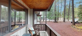 Immerse yourself in the charm of this delightful cabin tucked among the pines