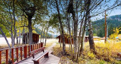 Scenic retreat w/two cabins, abundant wildlife, forest views, & fishing
