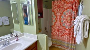Hair dryer, towels, soap, shampoo