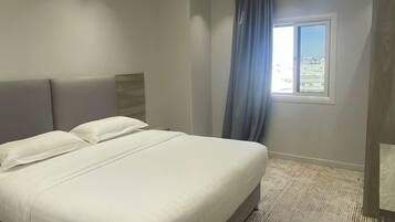 Family Apartment, City View | Premium bedding, pillow-top beds, soundproofing, iron/ironing board