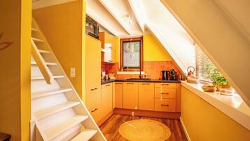 Fridge, highchair, dining tables