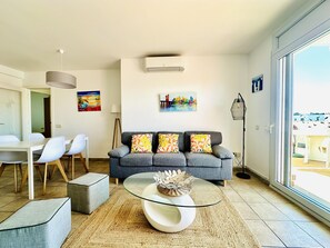 TV - Family Getaway: Bright Apt with Pool, Garden, A/C & Terrace, Near Beach, Sleeps 4 (Roses)