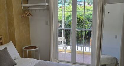 Charming 2-bedroom condo in cool Baguio with WiFi and access to fitness room
