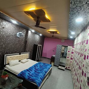 Deluxe Room, Balcony, City View | Desk, bed sheets - Tridev Restaurant By GRB (Muzaffarpur)