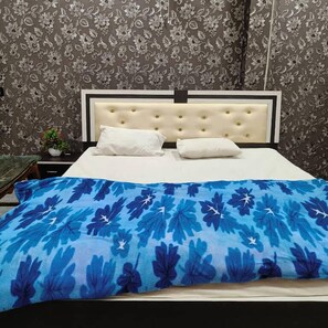 Deluxe Room, Balcony, City View | Desk, bed sheets - Tridev Restaurant By GRB (Muzaffarpur)