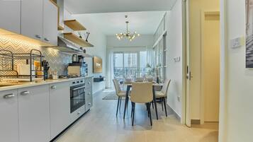 Standard Apartment, 1 Bedroom, Balcony | Private kitchen | Electric kettle, toaster