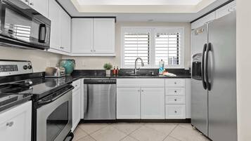 Condo, Multiple Beds, Balcony, Ocean View (Shipwatch Surf & Yacht Club D502) | Private kitchen | Fridge, microwave, oven, stovetop