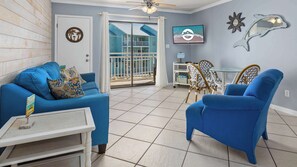 Condo, Multiple Beds, Balcony, Partial Ocean View (Sugar Beach 223) | Living area | 42-inch flat-screen TV with digital channels