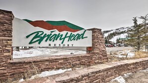 A Brian Head Resort sign with a mountainous backdrop. - Walk to Giant Steps & Hot Tub: Brian Head Condo! (Brian Head)
