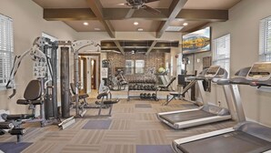A gym with treadmills, weight machines, and dumbbells. - Landing | Stylish 1BD, Gym, Courtyard (Broken Arrow)