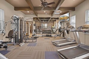A gym with treadmills, weight machines, and dumbbells. - Landing | Beautiful 2BD, Pool, Gym (Broken Arrow)