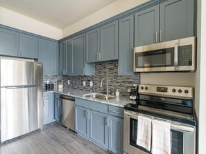 Fridge, microwave, oven, stovetop - Landing | Amazing 1BD, Pool, Yoga Studio (Houston)