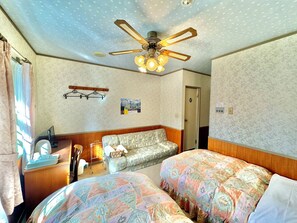 Chambre Confort avec lits jumeaux, vue jardin