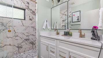 Shower, hair dryer, towels