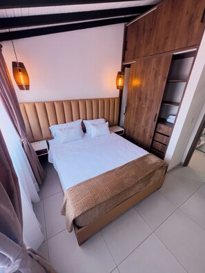 3 quartos, ferros/tábuas de passar roupa, Wi-Fi, roupa de cama