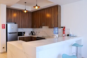 Fridge, microwave, stovetop, coffee/tea maker - Comfort & Views: 3B Apt in Marbella, RAK (Dubai)