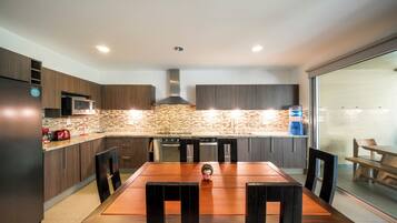 Deluxe Condo, Balcony, Pool View | Private kitchen | Toaster