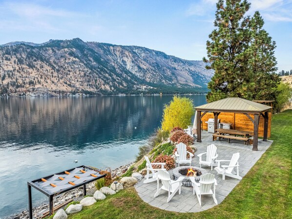 Terrace/patio - NEW! Gorgeous lake home w/ private pool, hot tub, lake access with dock & views! (Manson)