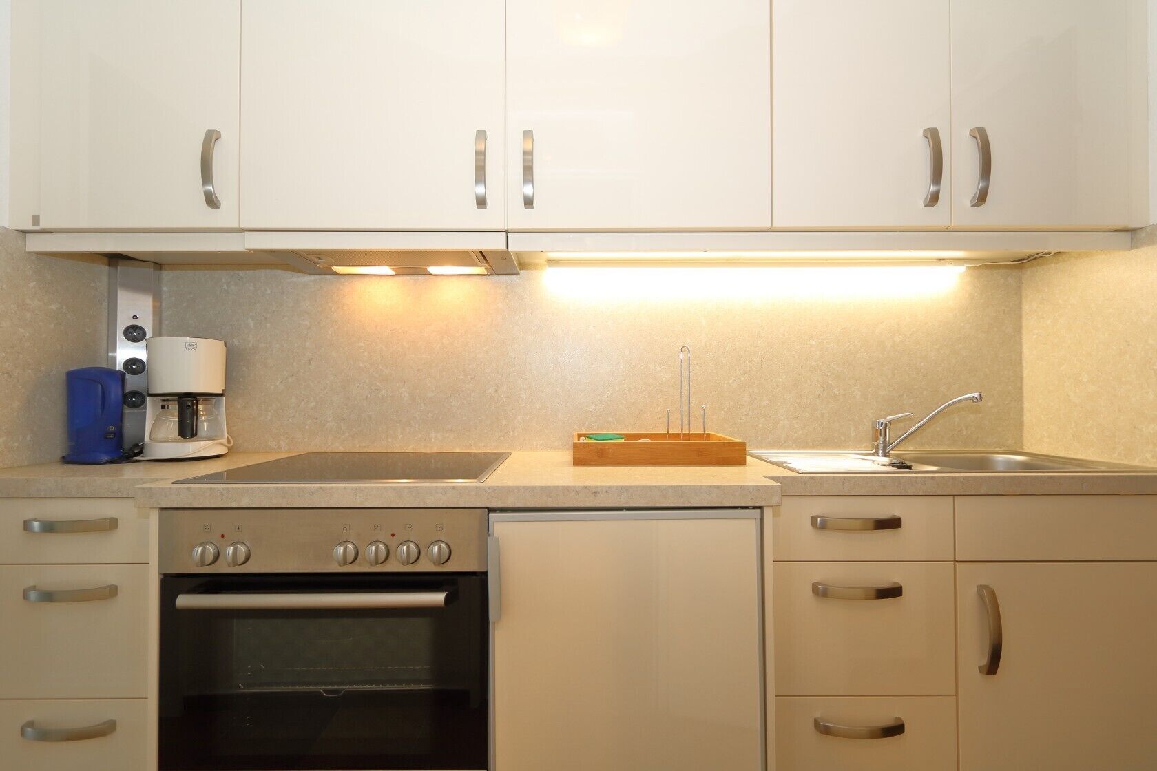Coffee/tea maker, fridge, oven, toaster