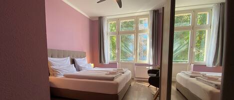 Double Room, 1 King Bed, Private Bathroom, City View | Blackout drapes, iron/ironing board (on request), WiFi (free)