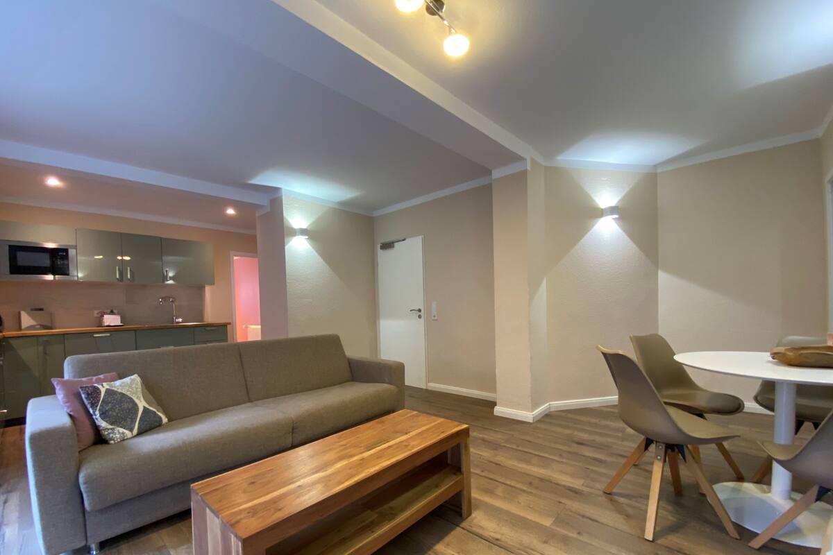 Departamento, 1 habitación, cocina, vista a la ciudad | Área de sala de estar