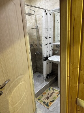 Hair dryer, towels, soap, shampoo